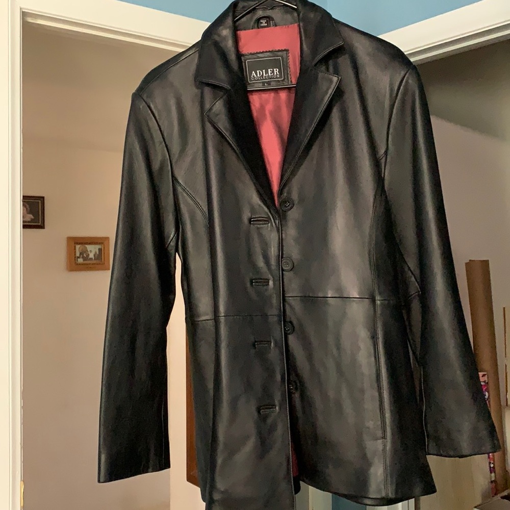 Black leather jacket. Versatile, fully lined, with pockets.